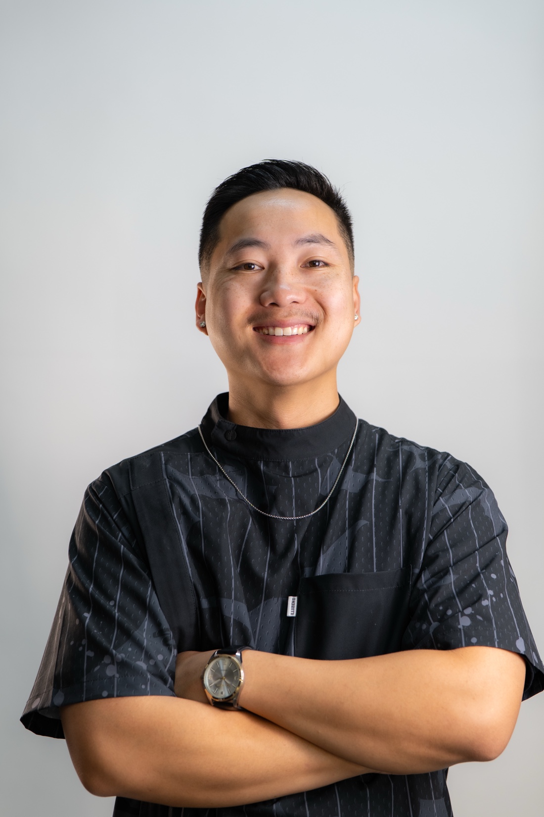 Adam Xiong - Kongo Barbershop barber