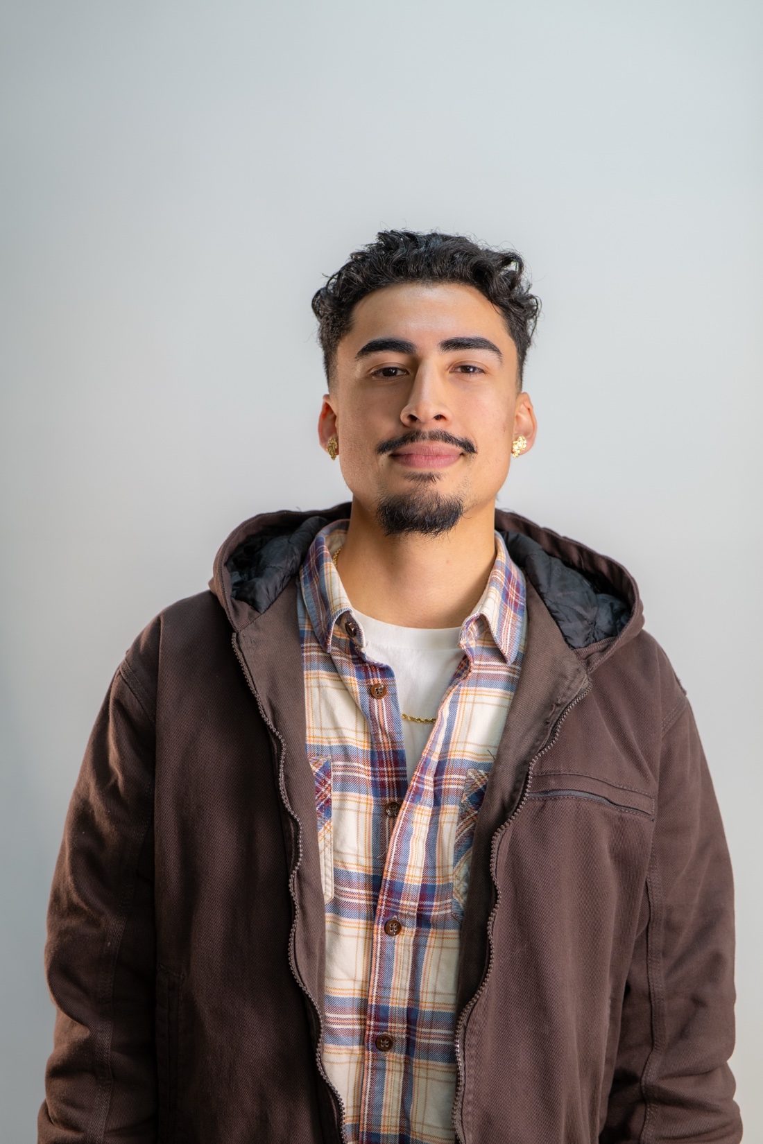 Caleb Olivarez - Kongo Barbershop barber